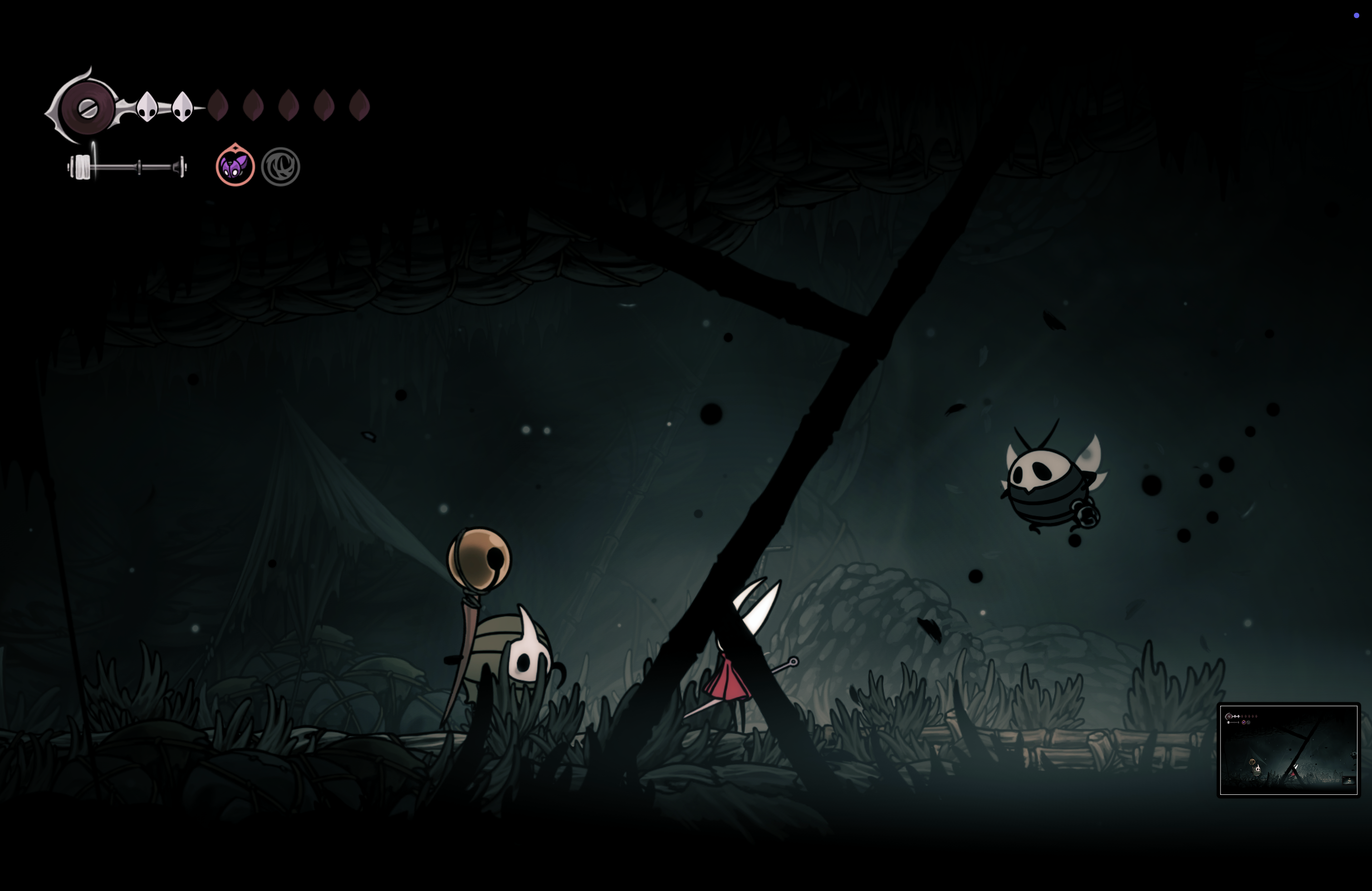 Hornet faces a flying enemy in a dim cavern.